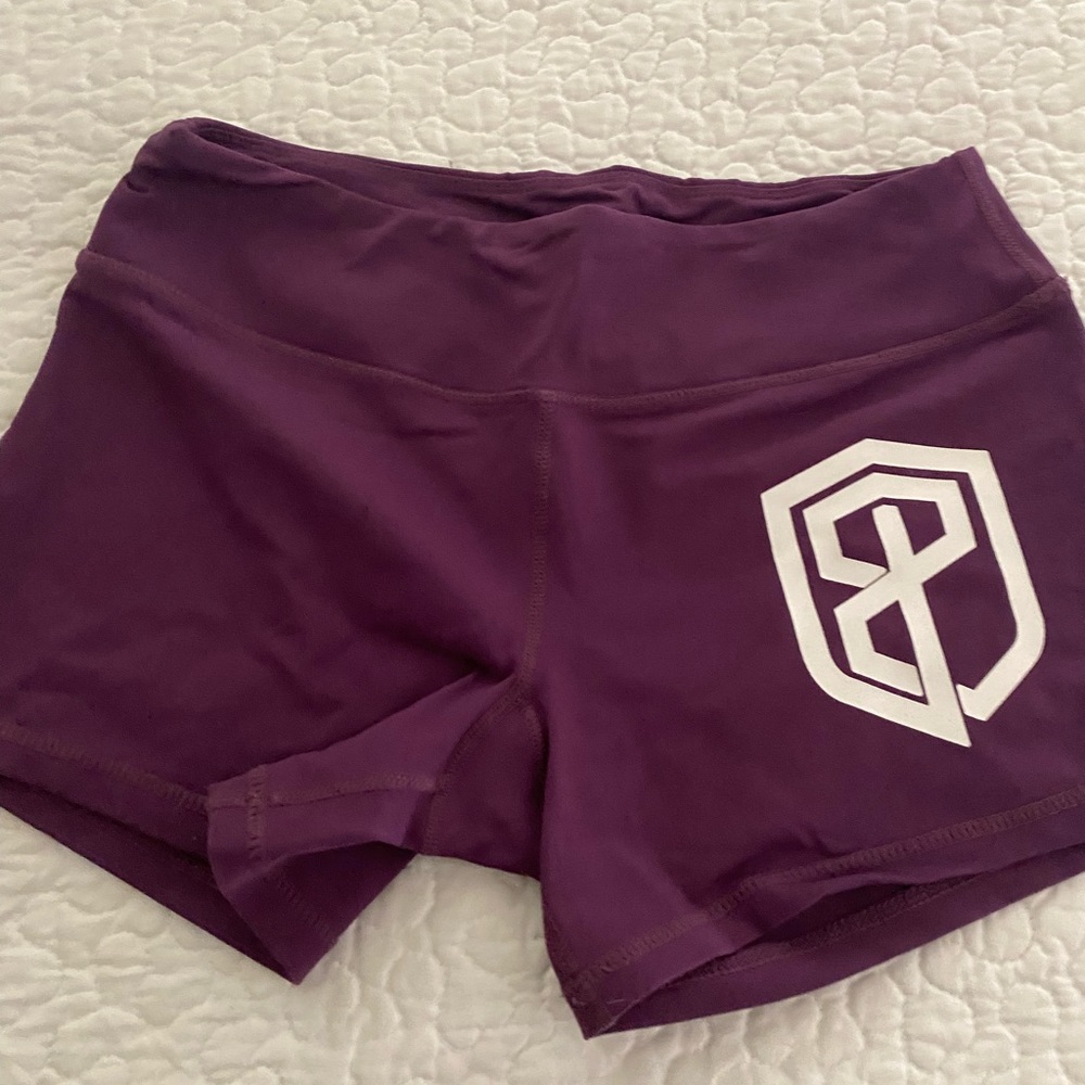 Born primitive workout shorts plum color medium lightly used